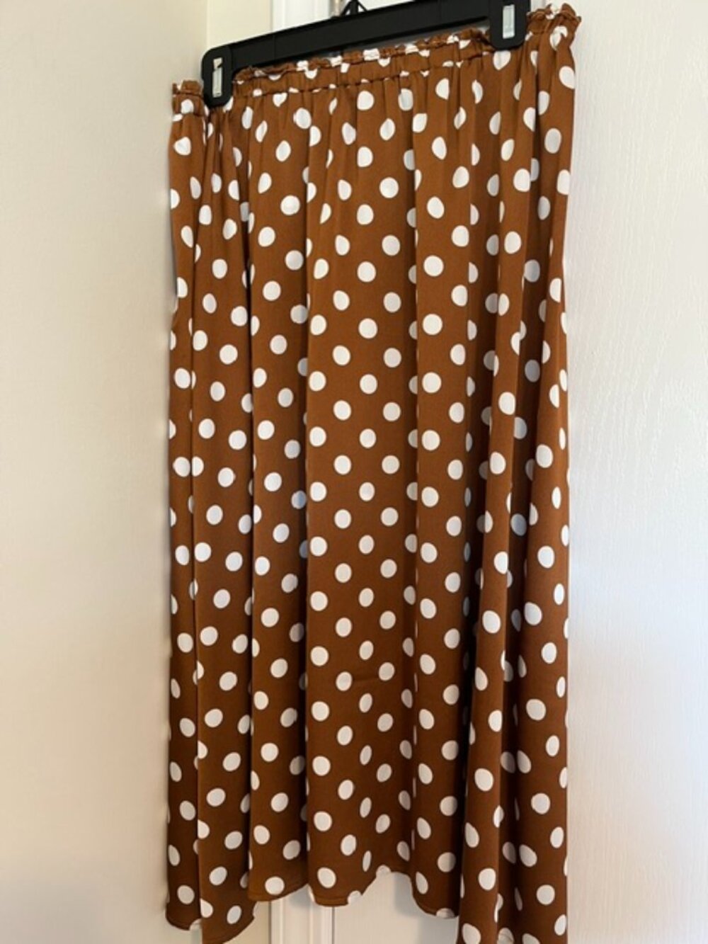 Brown polka dot satin flare skirt.